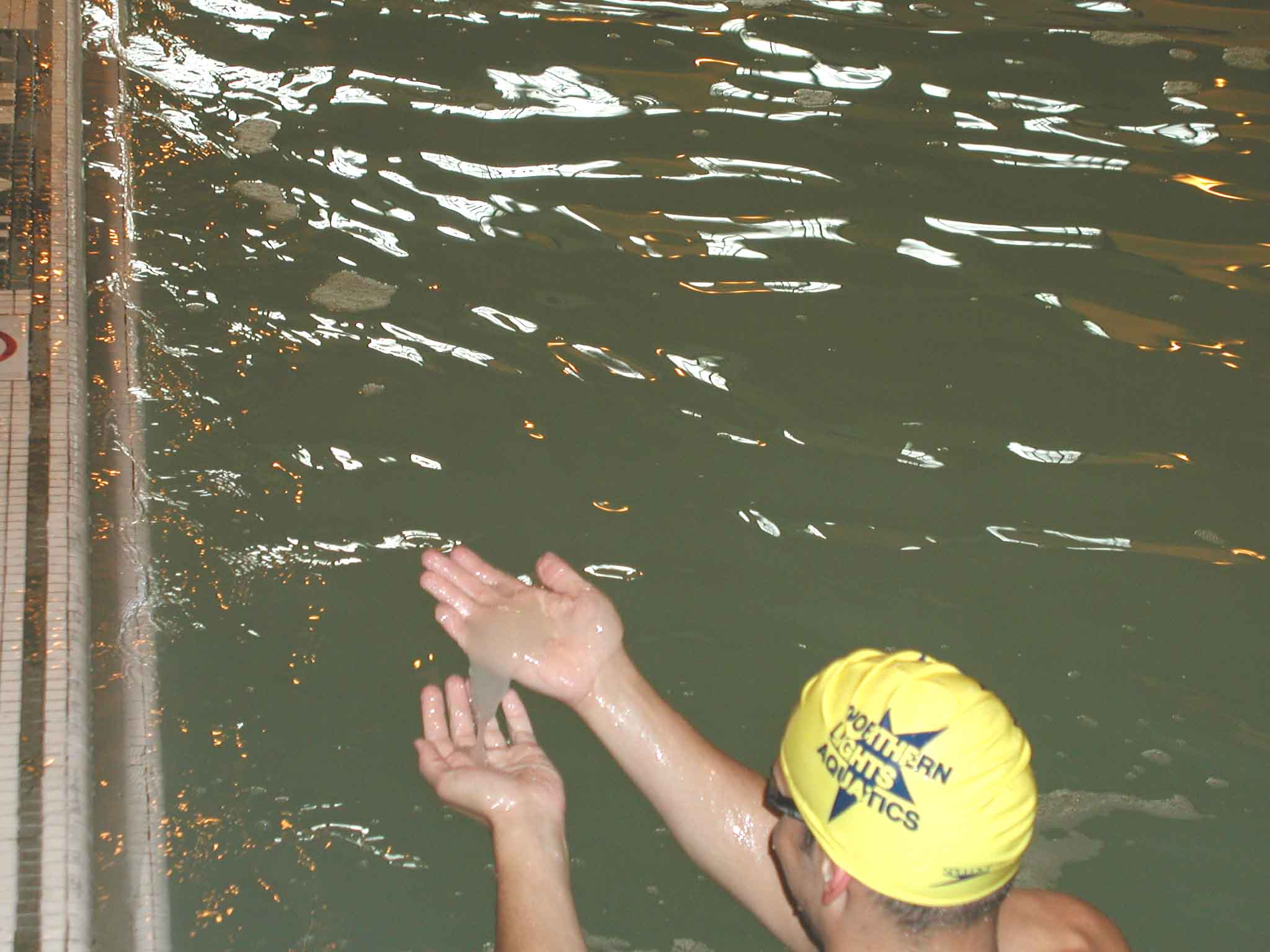 One of the swimmers handles the goo